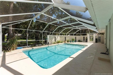 Screened-in pool/patio.