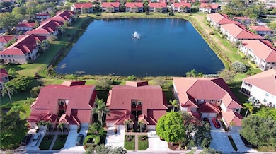 Aerial view with a residential view and a water vi
