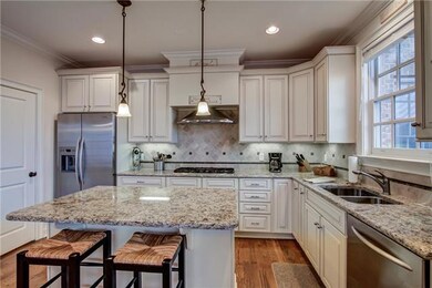 Another view of the great kitchen to show the beautiful tile backsplash.