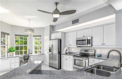 Open kitchen with built-in desk/office, pantry can
