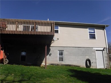 Rear view of house and deck