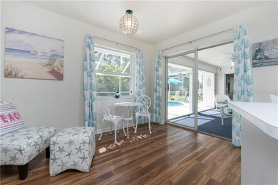 Dinette area off Kitchen with sliding door to Lana
