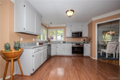 Kitchen featuring stainless steel appliances, crow