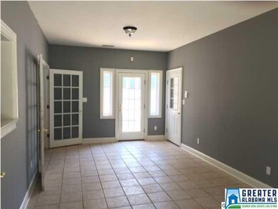 Great sun room with tile floors just off of the po