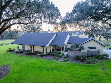 Set back along a long private drive sits the unquie farm residence