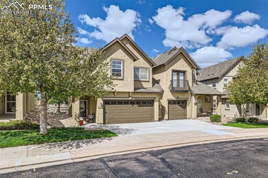 Townhome / multi-family property with a balcony, s