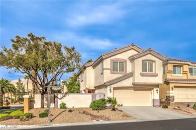 View of front of house featuring concrete driveway