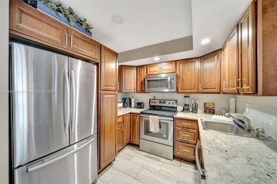 Gorgeous remodeled kitchen with SS appliances. Granite countertop