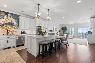 Kitchen featuring stainless steel dishwasher, sink