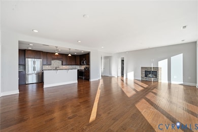 open concept kitchen, living and dining room