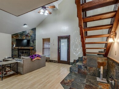 Living room with ceiling fan, hardwood / wood-styl