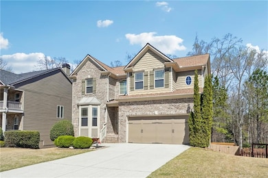 View of front of house featuring brick front, conc