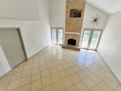 Beautiful fireplace is nestled in the living area