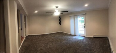 family room with sliding glass doors to deck and f
