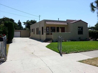 Front of House with 2 car garage and huge driveway