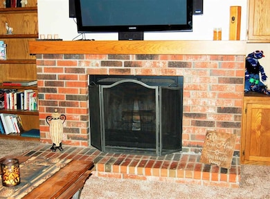 Gas-start woodburning fireplace