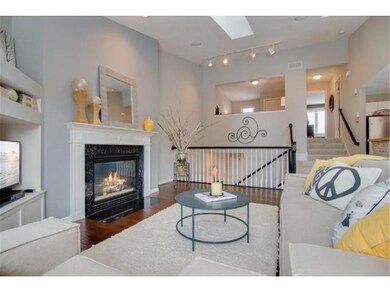 The main level living room has an inviting feel, w