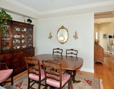 Dining Room. The dining room is open to the living