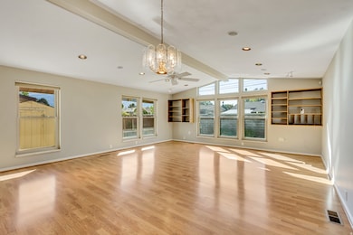 Unfurnished living room featuring light wood-style floors, a chandelier, and recessed lighting