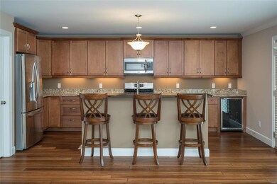 Gourmet kitchen with breakfast bar