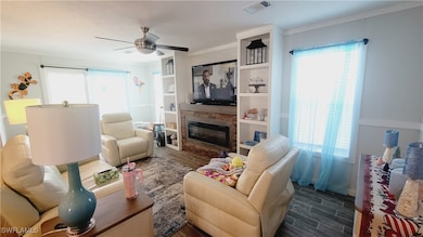 Living room featuring a wealth of natural light, a