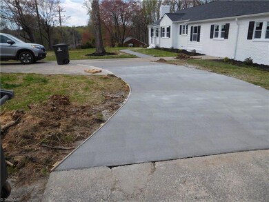 This home has a main level 2 car garage as well as a 1 car basement garage. All New Concrete Sidewalk just poured.  Fresh exterior Paint to really make this home POP!