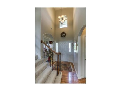 Grand 2-story entry  with hardwoods