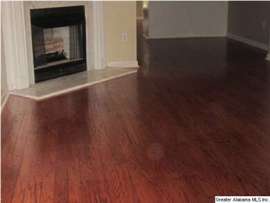 HARDWOODS IN FAMILY ROOM, DINING AREA AND KITCHEN