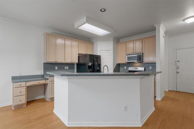 Built in desk off kitchen.