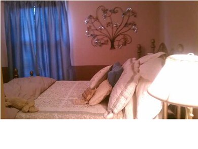 The master bedroom is spacious enough for a queen 