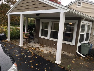 Nice covered porch for outdoor dining.
