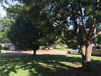 Front Yard with Street View of Neighborhood