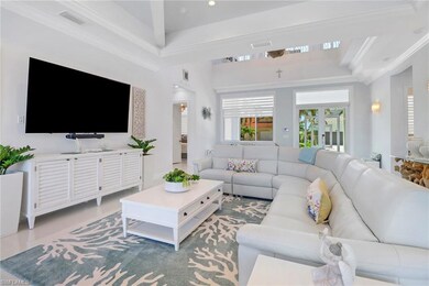 Living area featuring ornamental molding