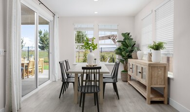 Dining area with sliding door to the covered patio
