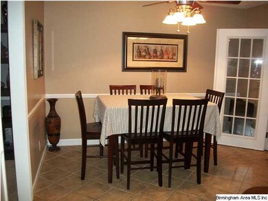 Breakfast room opens to the sun room and living room.