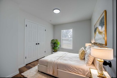 Bedroom featuring hardwood / wood-style floors and