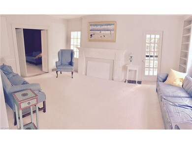 Formal Parlor with fireplace and walk out to side 