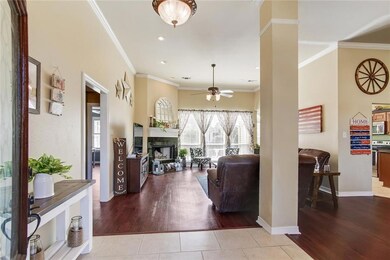 Den has high ceilings, recess lighting, ceiling fa