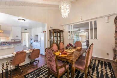 View from corner of dining room into kitchen - note the convenient dining bar and double ovens in the kitchen!