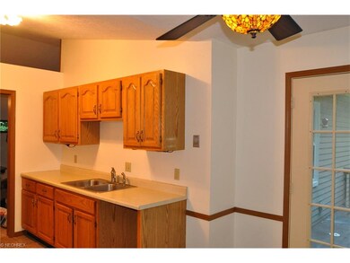 Nice cabinets. Shows door to outside deck.