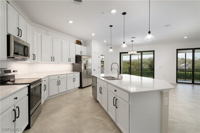Kitchen featuring a sink, stainless steel applianc