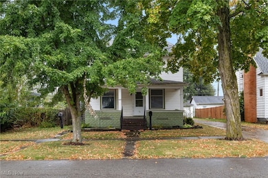 Obstructed view of property featuring covered porch