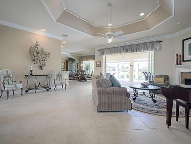 Living room with DIAGONAL CERAMIC TILE ... CROWN M