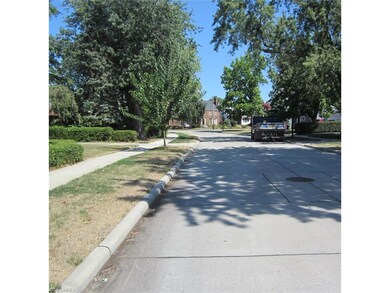 view down street    pothole and repair free