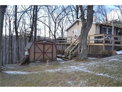 Exterior Front. Shed included - stairs to side and