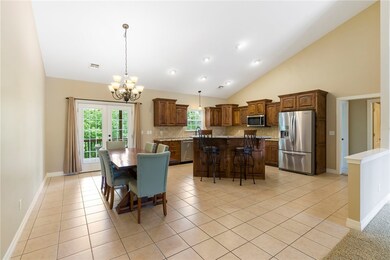 Large eat-in kitchen with access to the back deck.
