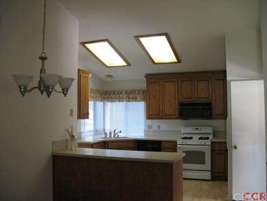 You are looking across the dining nook with vaulte