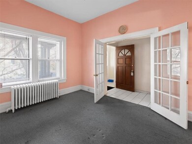French doors from hallway to formal living room