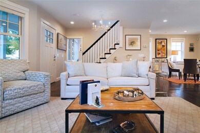 Open living room gas fireplace offers multiple ent