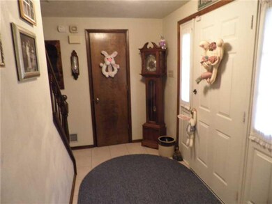 Entry/Foyer. ENTRY LEVEL WITH CERAMIC TILE AND LAR